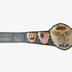 The New Ring of Honor (ROH) Wrestling Championship Leather Belt is a masterfully crafted and highly esteemed accolade in the realm of professional wrestling. This belt symbolizes the pinnacle of achievement within ROH, a promotion celebrated for its commitment to pure wrestling and high-caliber competition. The New ROH Wrestling Championship Leather Belt is not only a testament to the skill and dedication of its holders but also a work of art, meticulously designed to honor the rich heritage and prestige of the championship. The central plate of the New ROH Wrestling Championship Leather Belt is a marvel of design and craftsmanship. At its heart, the ROH logo is prominently featured, representing the promotion's storied legacy and dedication to the art of wrestling. The logo is surrounded by intricate engravings that depict wrestlers in dynamic action poses, classic wrestling holds, and symbolic motifs that reflect the essence of professional wrestling. These details are etched with precision, creating a visually stunning and intricate representation of the championship's significance. The background of the central plate is adorned with a textured pattern that adds depth and dimension to the design, enhancing the overall visual impact of the belt. This attention to detail ensures that the belt is not only a symbol of excellence but also a striking and memorable piece of craftsmanship. Flanking the central plate are the side plates, which are equally impressive in their design. Each side plate features additional engravings that celebrate the legacy and achievements of past champions. These side plates often include the ROH logo and other symbols that honor the history and prestige of the title. The side plates are designed to be interchangeable, allowing for customization to recognize specific champions or commemorate special events. This feature adds a personal touch to the belt, making it unique to its holders and further enhancing its value as a cherished symbol of achievement. The strap of the New ROH Wrestling Championship Leather Belt is crafted from high-quality leather, ensuring both durability and a luxurious feel. The leather is dyed in a rich, deep black, exuding a sense of sophistication and authority. The edges of the strap are adorned with intricate stitching, reinforcing the belt's durability while adding an element of elegance. The buckle system is designed for both security and ease of use, ensuring that the belt remains firmly fastened during intense matches and high-stakes competitions. One of the most striking features of the New ROH Wrestling Championship Leather Belt is its weight. The heft of the belt serves as a tangible reminder of the honor and responsibility that come with being a champion. Holding the belt is a physical experience that symbolizes the countless hours of training, the hard-fought battles, and the unwavering dedication required to reach the summit of the wrestling world. Beyond its physical attributes, the New ROH Wrestling Championship Leather Belt carries deep symbolism. It represents the pinnacle of achievement for wrestlers within the ROH promotion, recognizing their skill, dedication, and excellence. Each time the belt changes hands, it signifies the passing of a torch, acknowledging a new champion who has risen to the challenge and proven themselves worthy of the title. The belt is not merely a piece of hardware; it is a living legacy, a testament to the champions who have come before and the champions who will follow. The New ROH Wrestling Championship Leather Belt also reflects the evolution of professional wrestling. It symbolizes the integration of fresh, innovative talent into ROH's storied tradition, celebrating the unique style and energy that the promotion brings to the sport. The belt serves as a bridge between the past and the future, honoring the heritage of wrestling while paving the way for new generations of champions. In the world of professional wrestling, championship belts are more than just trophies; they are symbols of greatness. The New ROH Wrestling Championship Leather Belt embodies this principle, capturing the essence of competition, honor, and excellence. Its design, rooted in tradition yet timeless in its appeal, ensures that it will remain a coveted prize for generations of wrestlers to come. Whether displayed proudly in a trophy case or worn around the waist of a reigning champion, the New ROH Wrestling Championship Leather Belt stands as a testament to the enduring legacy of the sport and the athletes who dedicate their lives to it.